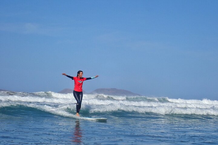 Clase grupal de surf Longboard en Lanzarote